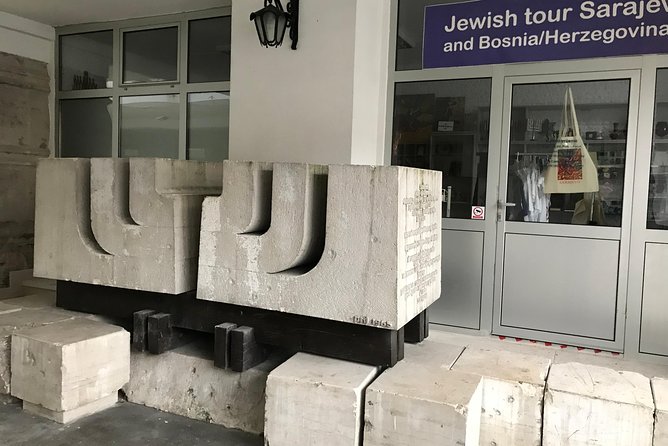 Sarajevo: Jewish Heritage Tour - Eternal Flame area: Jewish education, shops, and the first hotel clue